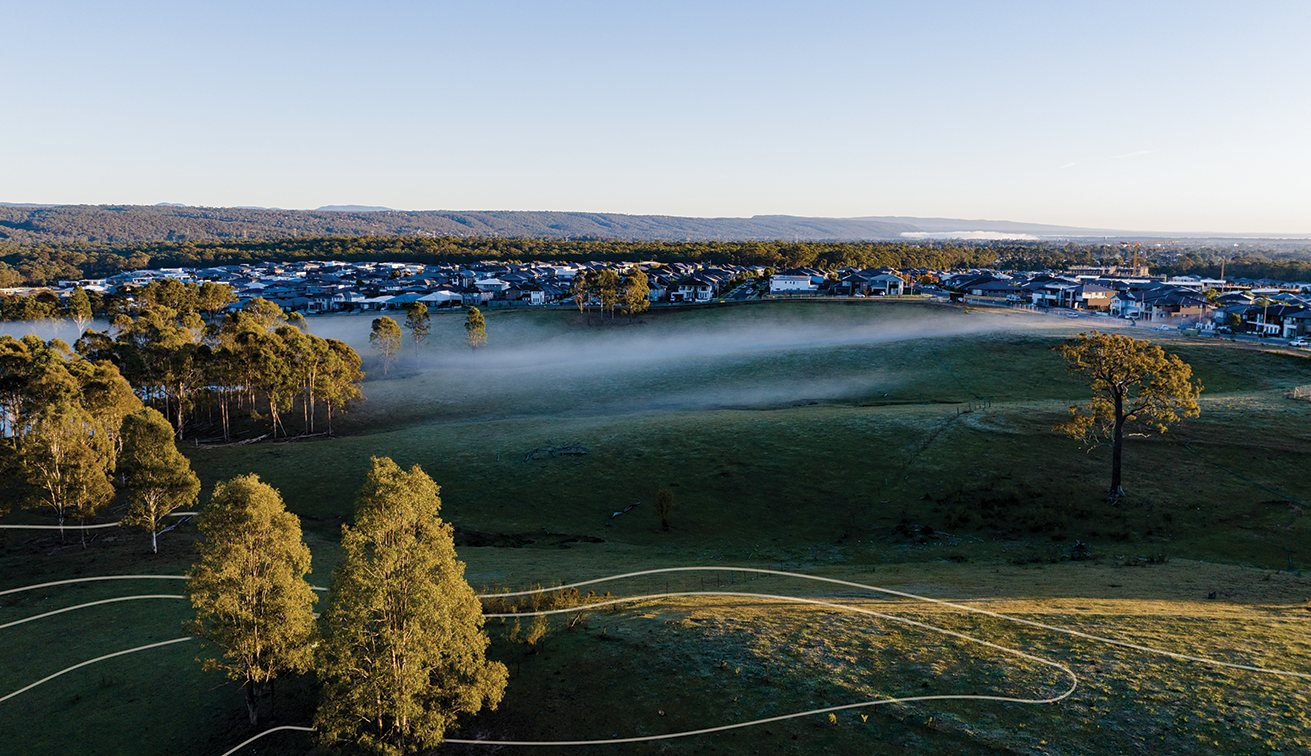 Aerial view of Highland Views at sunrise